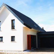 Réalisation maison deux pans garage double toit plat accolé